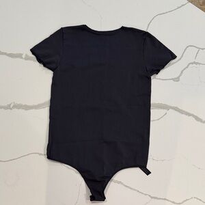 SKIMS essential black bodysuit